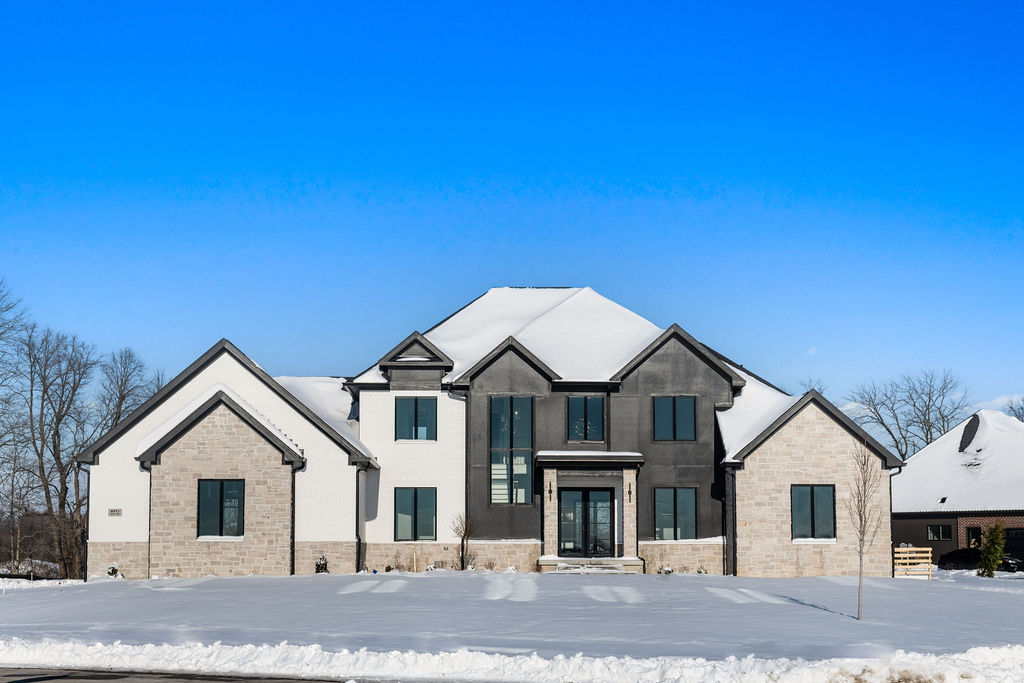 Black, white, and tan custom home exterior