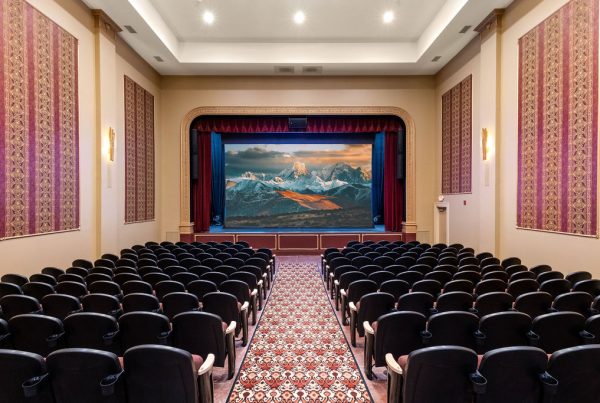 Movie theater view of screen from seating area